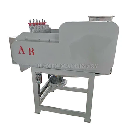 Automatisk cashewnskellemaskine